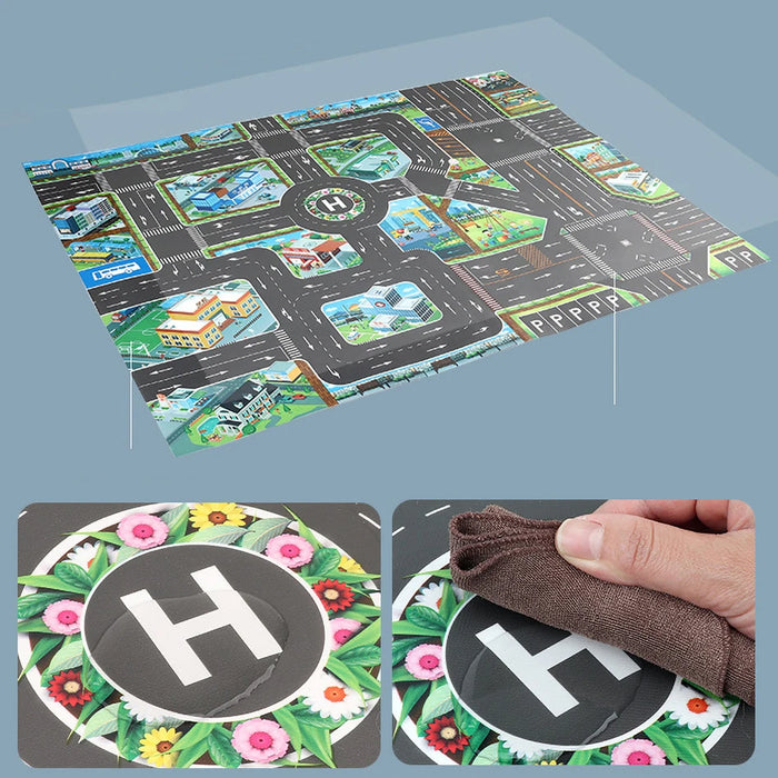 The Lacatang Shop's Colorful Cartoon City Traffic Play Mat with Toy Cars encourages cognitive skills in kids, featuring roads, buildings, and a helipad with a floral border. A hand wipes the helipad area clean using a cloth.