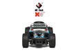 The WLtoys 1:28 284131 284161 Racing Mini RC Car from the Lacatang Shop features large, rugged tires and a detailed blue and black exterior. Above the vehicle, the "WL Tech" and "X" logos are prominently displayed. Equipped with a lithium battery for extended playtime, this high-speed remote control car can reach speeds up to 30KM/H. It is pictured from a lower frontal perspective against a white background.