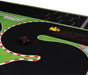 The Lacatang Shop Portable Turbo Racing 1.6x0.9m Table Mat for Mini RC Cars features a curvy rubber track with red and white borders on a green and black background, complete with a checkerboard finish line in the top right. The set includes a yellow car and a black off-road vehicle.