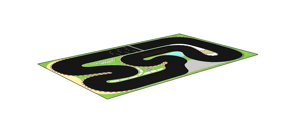 The Lacatang Shop's Portable 1.6x0.9m Turbo Racing Rubber Mat, ideal for Mini RC Car Table Racing enthusiasts, features a green surface with a black track bordered in white and red, several curves, a starting line, grassy areas, and a small building with parking spaces.