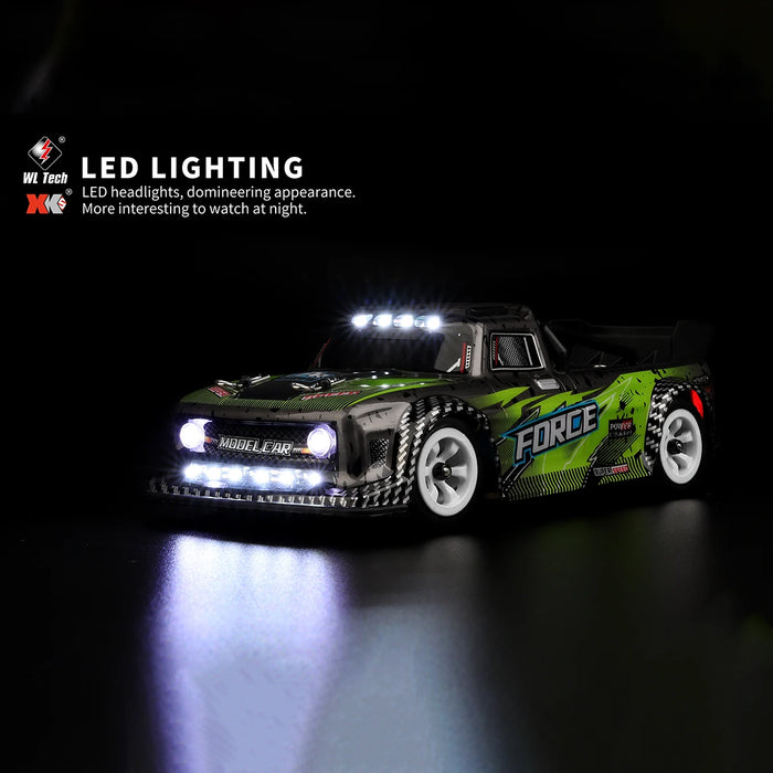 A WLtoys 1:28 284131 284161, a green and black mini remote-controlled sports car from Lacatang Shop, featuring bright LED headlights and roof lights, is displayed against a dark background. The text "LED LIGHTING" along with a description emphasizing its impressive nighttime visual appeal are positioned on the image's left side. This high-speed RC car can reach speeds of 30KM/H and is powered by a high-capacity lithium battery.