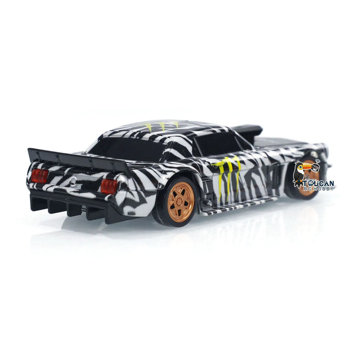 Displayed against a white background, the Lacatang Shop's "Gifts Outdoor Toys 1/43 RC Mini Race Cars 2.4g Radio Control Drift Car 4WD High-Speed Motor Vehicle Model for Boys TH23884" features a striking white and black zebra-stripe paint job. This impressive high-speed model toy car boasts bronze-colored wheels, a rear spoiler, and what appears to be a roll cage inside. Its detailed features include side mirrors and rear lights, making it a standout RC drift car.