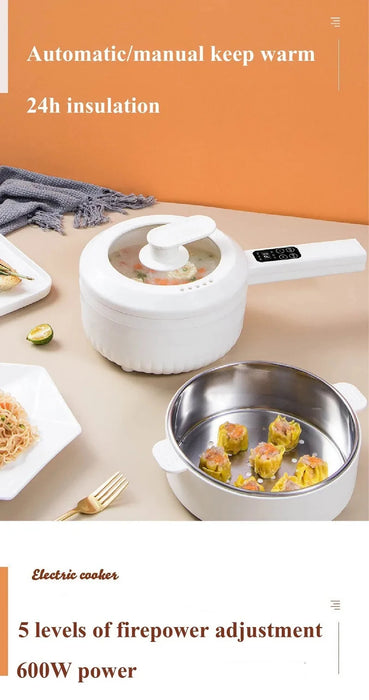 Image of the 1.6L Smart Electric Cooking Pot Reservation Multifunctional Non-stick Electric Wok Household Electric Hot Pot With Steamer 220V by Lacatang Shop with a pot of soup and a stainless steel pan containing steamed dumplings. The cooker has a digital display on the handle, showcasing features like "Automatic/manual keep warm," "24h insulation,” and “5 levels of firepower adjustment, 600W power.” A plate of noodles and some sliced vegetables are placed nearby.