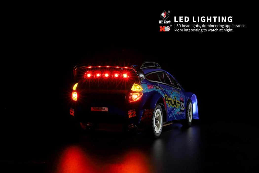 A WLtoys 1:28 284131 284161 Racing Mini RC Car from Lacatang Shop, featuring illuminated LED headlights and rear lights, is showcased against a dark background. The car sports a blue livery adorned with vibrant decals. Text on the image reads: "Remote Control Car – LED headlights, domineering appearance, powered by a Lithium Battery for speeds up to 30KM/H. More interesting to watch at night.