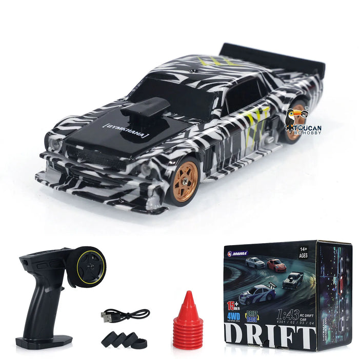 The Gifts Outdoor Toys 1/43 RC Mini Race Cars 2.4g Radio Control Drift Car from Lacatang Shop is displayed alongside its remote control, charging cable, cone, small parts, and packaging. This high-speed motor vehicle model features a zebra-striped black and white pattern with hints of yellow and bronze wheels. The packaging prominently displays the word "DRIFT" in large letters.