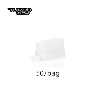 A compact white plastic set, featuring a rectangular piece and a small cylinder, embodies the excitement of the "Turbo Remote Control Drift Car Track for All Ages" from Lacatang Shop. "50/bag" appears below with the "Turbo Racing" logo at the top left on a pristine white background.