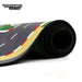 The Lacatang Shop's Portable Turbo Racing Rubber Track Mat (1600x900mm) is a fun table racing accessory with gray racetracks and green, red, and yellow details. It features the "Turbo Racing" logo in the top left corner, perfect for 1:76 RC mini cars to zoom around.