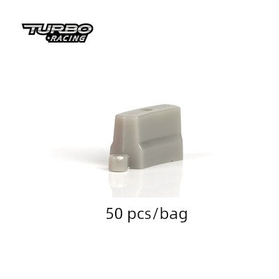 A gray accessory with a small metallic section features the "Turbo Racing" logo in the top left corner, ideal for your Turbo Mini Drift Scene Remote Control Car Track from Lacatang Shop. Text below reads "50 pcs/bag.