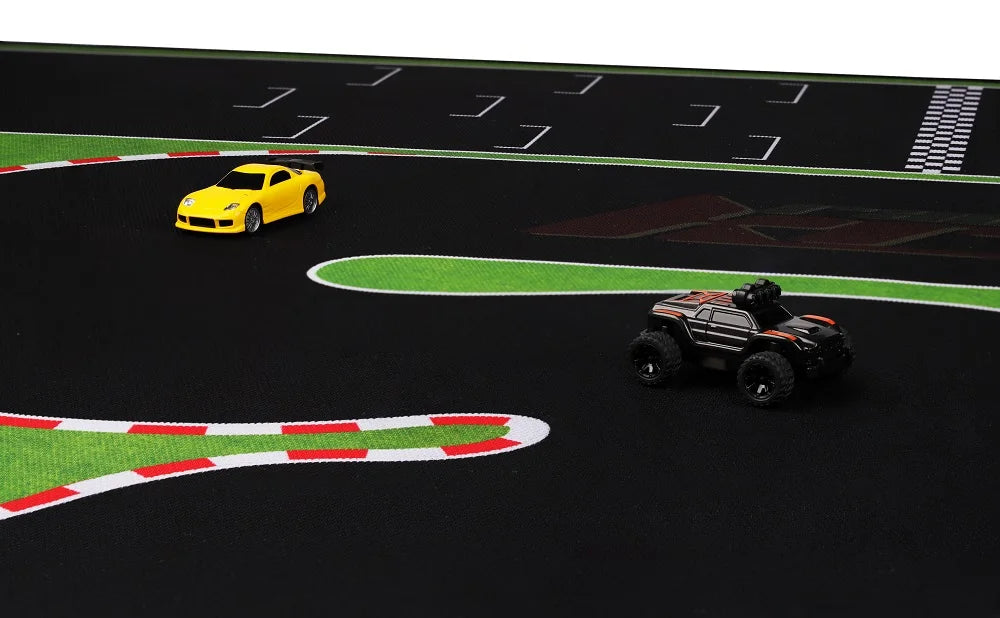 Two toy cars race on a Lacatang Shop Portable Turbo Racing Rubber Track Mat: a yellow sports car and a black off-road vehicle. This exciting setting features curved lanes, red/white markings, and a green/black backdrop, ideal for 1:76 RC mini cars.