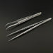 Two pairs of AliExpress Industrial Tweezers Electronics Anti-static Curved Straight Tip with hole patterns on the polished stainless steel handles are displayed on a dark surface. One pair has pointed tips, while the other pair has curved tips designed for precision tasks.