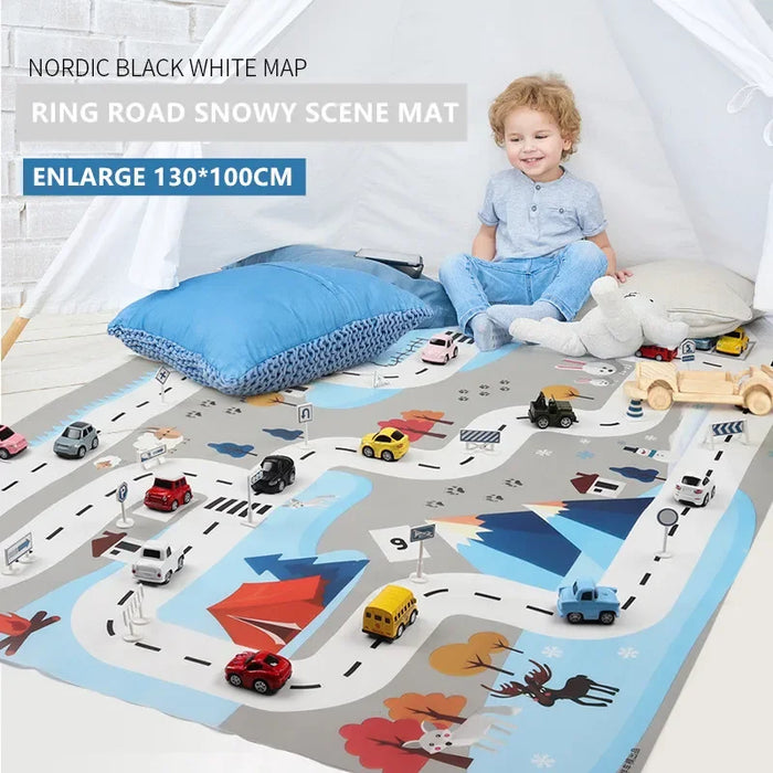 A child sits on Lacatang Shop's Interactive City Traffic Play Mat, "Ring Road Snowy Scene Mat," featuring winding roads with toy cars and trees. Measuring 130x100 cm, this waterproof educational rug comes with a blue pillow and a cuddly stuffed animal.