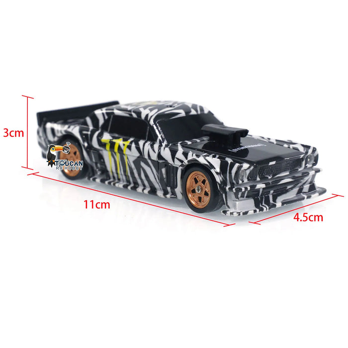 A toy RC Drift Car, product name "Gifts Outdoor Toys 1/43 RC Mini Race Cars 2.4g Radio Control Drift Car 4WD High-Speed Motor Vehicle Model for Boys TH23884" by Lacatang Shop, is shown with a black and white zebra pattern design. The car features a large rear spoiler and copper-colored wheels. Red measurement lines indicate the car's dimensions: 11 cm long, 4.5 cm wide, and 3 cm tall. The "TOUCAN" logo is visible in the image.