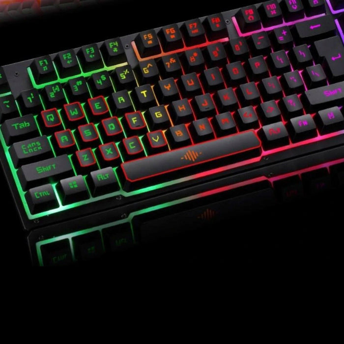 The Ninja Dragons Z4 104 Keys LED Flame Gaming Keyboard by Yellow Pandora features stunning RGB backlighting, showcasing a mesmerizing gradient of colors from green to red. With its standard QWERTY layout and a prominently lit orange spacebar, this mechanical keyboard enhances your gaming experience with an intriguing visual flair.