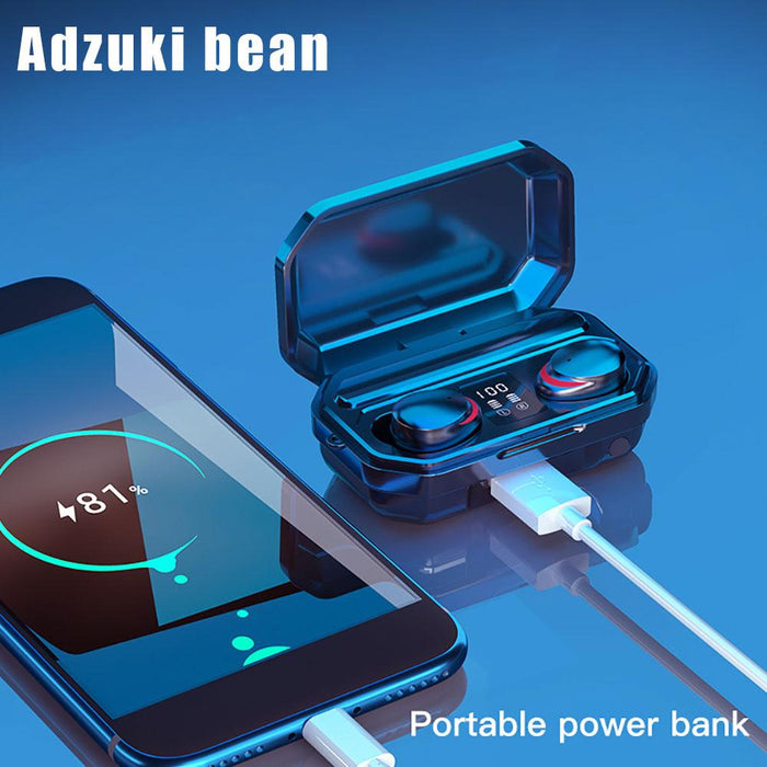 A pair of blue Ninja Dragon M12PRO 3D Surround Sound Bluetooth 5.0 True Wireless Earbuds from Yellow Pandora in an open charging case, connected by a cable to a smartphone. The smartphone, displaying a charging status of 81%, rests on a blue surface. The text "Adzuki bean" and "Portable power bank" is visible in the image.