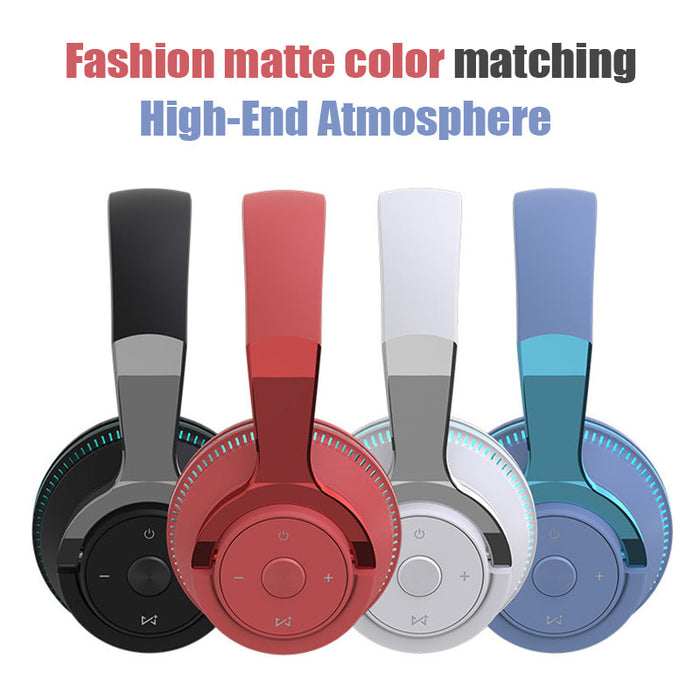 Four wireless headphones from Yellow Pandora's Ninja Dragon Wireless Light Changing Bluetooth Gaming Headset line are displayed in a row, showcasing different colors: black, red, white, and blue. The text above reads, "Fashion matte color matching High-End Atmosphere." These Wireless Bluetooth 5.1 gaming headsets feature a sleek, modern design with multiple round buttons and noise cancellation.